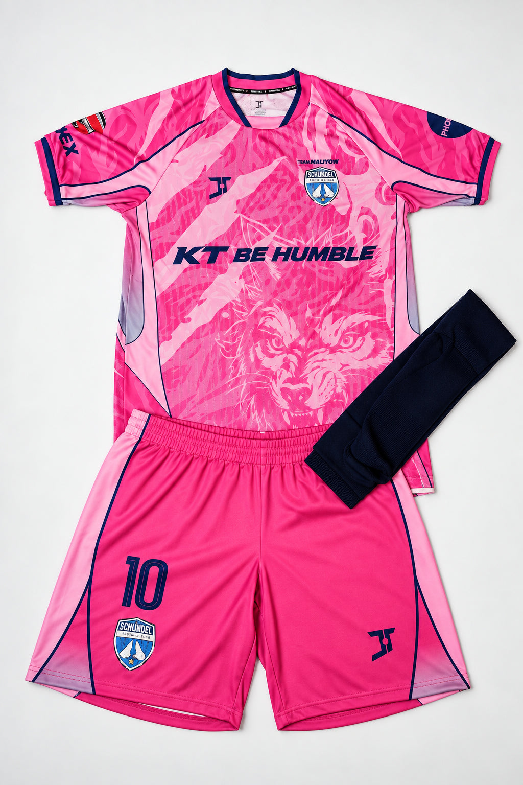 SCHIJNDEL FC × KT BE HUMBLE — UITTENUE  roze 2026/27